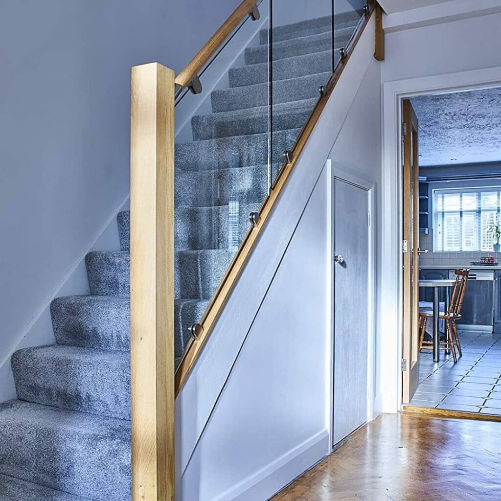 Staircase with glass balustrade and oak handrail - SE6 Services