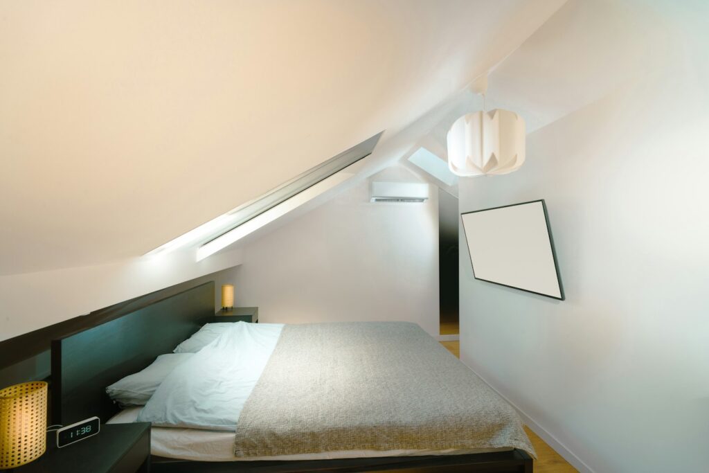 Loft conversion bedroom with skylight
