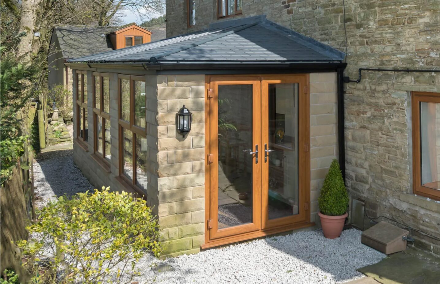 Stone and oak extension with French doors